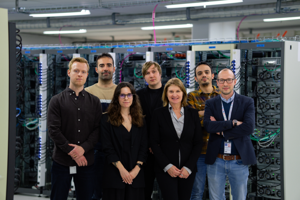 Group photo of the CERN openlab team in the CERN Meyrin Data Centre.
